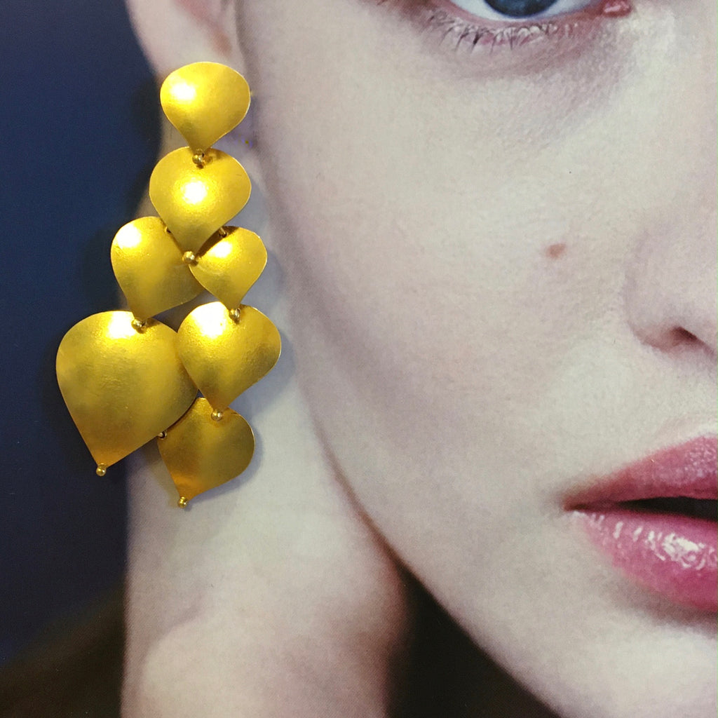 Teardrop seven part gold earrings